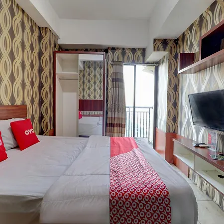 Oyo Life 92910 Apartemen Tamansari Panoramic By Tira